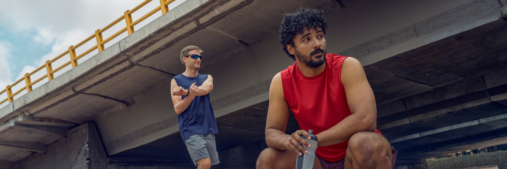 Two men resting after runing.